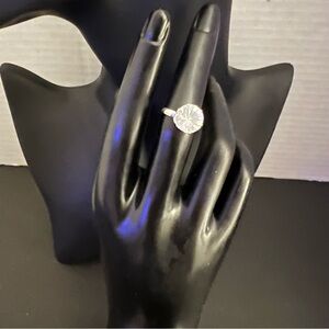 Good, preowned condition adjustable ring, silver tone